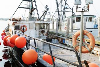 Detail of commercial fishing boat equipment at the dock.