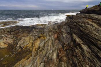 View of the rugged ocean rocky shore.