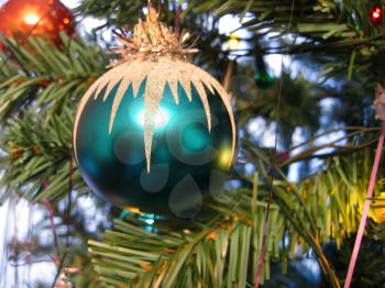 blue ball toy on christmas tree