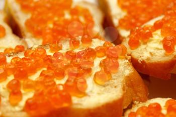 close-up of red caviar sandwich
