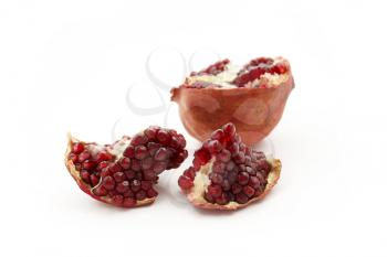 tasty pomegranate fruit on white background