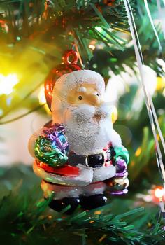 toy of santa claus on the christmas tree
