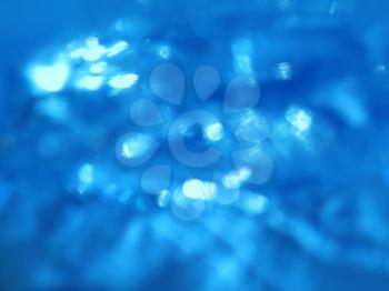blue circular reflections abstract background            