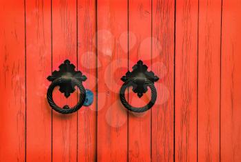 Royalty Free Photo of a  Red Door With Handles