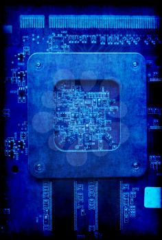 Vintage blue background with electronic circuit board