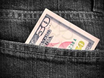 Money in the pocket of jeans
