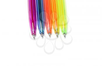 Closeup of colorful pens on white background