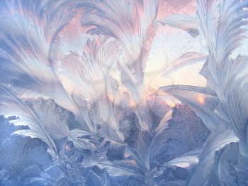 Beautiful ice pattern on winter glass, natural texture