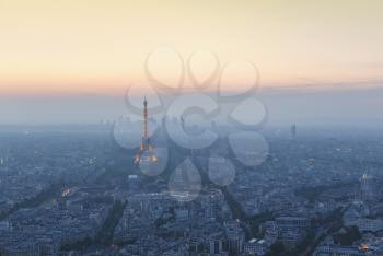Beautiful panoramic aerial view of Paris and Eiffel tower at sunset from Montparnasse Tower, Paris, France