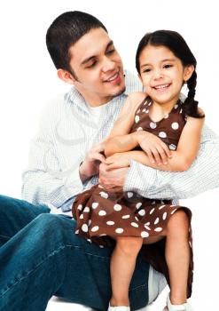 Royalty Free Photo of a Man Holding a Young Girl