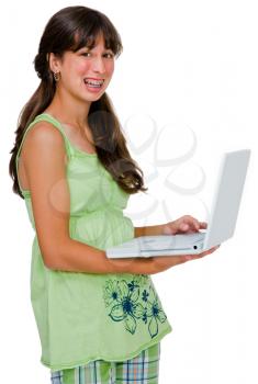 Royalty Free Photo of a Teenage Girl Holding a Laptop Computer