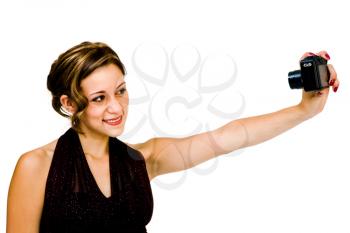 Royalty Free Photo of a Woman Holding a Camera out Facing Herself
