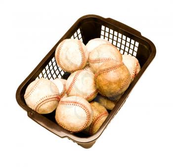 Royalty Free Photo of a Laundry Basket Full of Baseballs