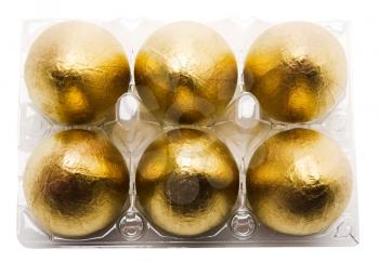 Royalty Free Photo of a 6 Golden Eggs in a Carton