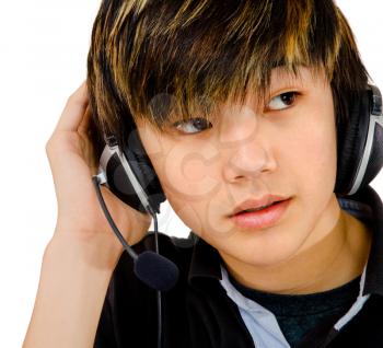 Royalty Free Photo of a Teenage Boy Wearing Headphones