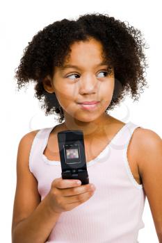 Royalty Free Photo of a Young Girl Holding a Mobile Phone