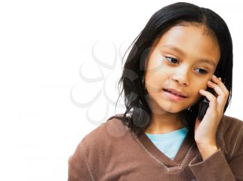 Royalty Free Photo of a Young Girl Talking on a Mobile Phone