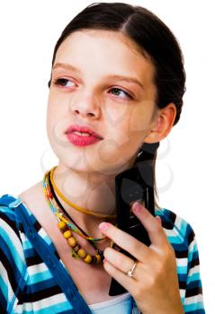 Royalty Free Photo of a Young Girl Texting on her Mobile Phone