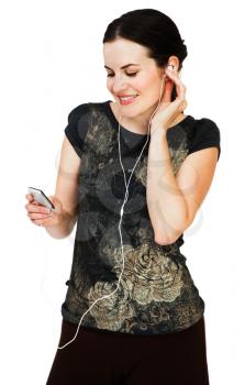 Royalty Free Photo of a Woman Listening to Music on an Mp3 Player