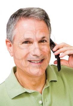 Royalty Free Photo of a Man Talking on a Mobile Phone