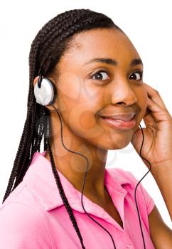 Royalty Free Photo of a Teenage Girl listening to Music on Headphones