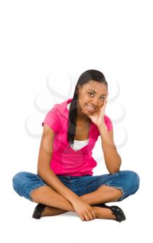Confident teenage girl posing and smiling isolated over white