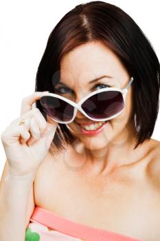 Caucasian woman wearing sunglasses isolated over white