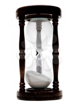 Old hourglass isolated over white
