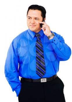Latin American businessman using a mobile isolated over white