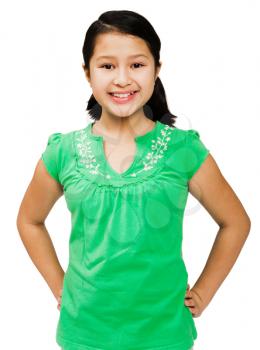 Smiling girl posing and standing isolated over white