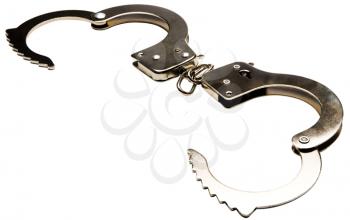 Steel handcuffs isolated over white