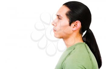 Latin American man thinking and posing isolated over white