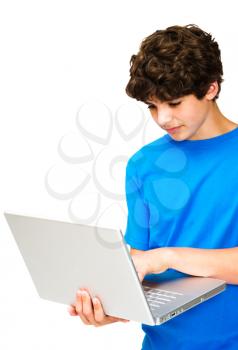 Close-up of a boy using a laptop isolated over white