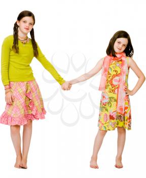 Close-up of girls holding their hands and smiling isolated over white