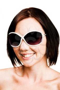 Close-up of a woman wearing sunglasses isolated over white