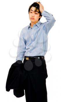 Tired teenage boy posing isolated over white