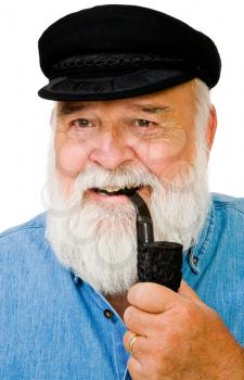 Man smoking with pipe and smiling isolated over white