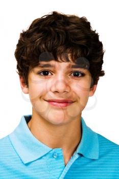 Smiling boy posing isolated over white