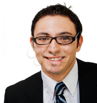 Close-up of a young businessman smiling isolated over white