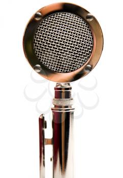 Single old microphone isolated over white