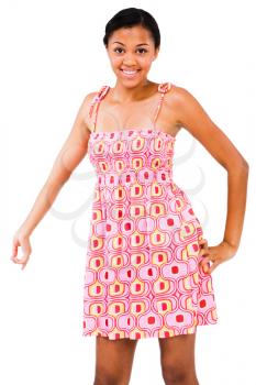 Teenage girl with hand on hip isolated over white