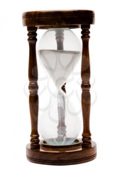 One old hourglass isolated over white