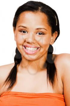 Portrait of a teenage girl smiling isolated over white
