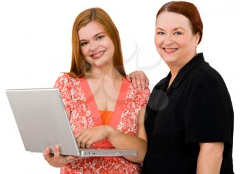 Confident women using a laptop isolated over white