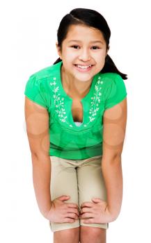 Portrait of a girl smiling and posing isolated over white