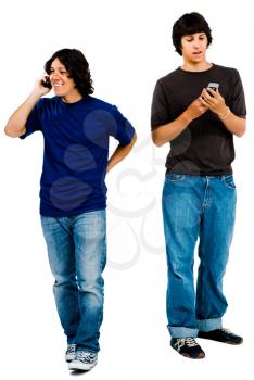 Happy men using mobile phones isolated over white