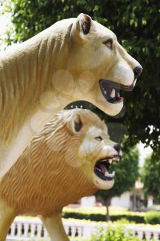Lion statues at a park, Chhatarpur Temple, New Delhi, India