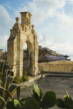Gate with a city in the background, Malta