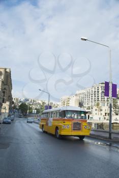 Bus on the road, Valletta, Malta