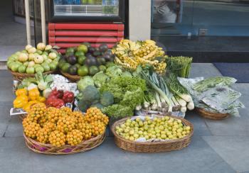 Fruits and vegetables for sale at a market stall, New Delhi, India